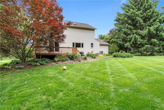 9852 Hocking St NW, Massillon, OH 44646 - view of grassy yard with a deck