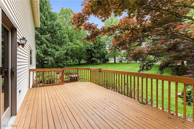 9852 Hocking St NW, Massillon, OH 44646 - deck with a yard and view of wooded area