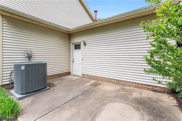 9852 Hocking St NW, Massillon, OH 44646 - view of patio / terrace featuring cooling unit
