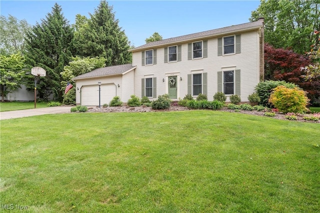 9852 Hocking St NW, Massillon, OH 44646 - colonial-style house featuring an attached garage, a front yard, driveway, and a chimney