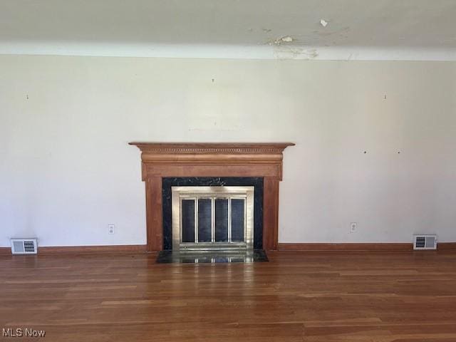 1081 Carver Rd, Cleveland Heights, OH 44112 - detailed view of wood finished floors, a fireplace with flush hearth, and baseboards