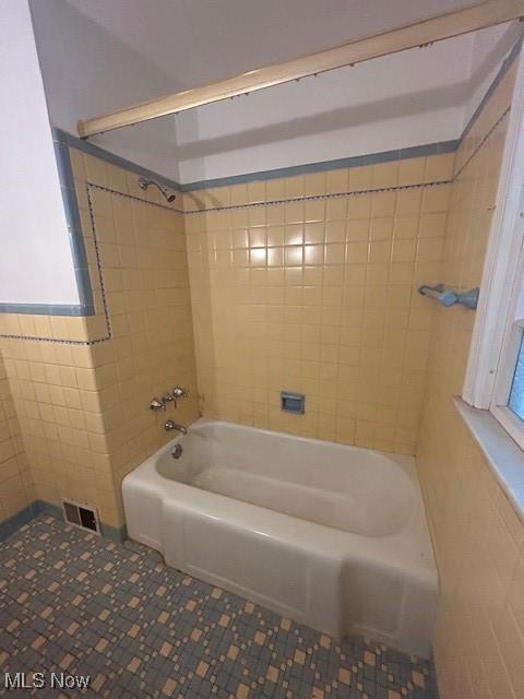 1081 Carver Rd, Cleveland Heights, OH 44112 - full bath with tile walls and tub / shower combination
