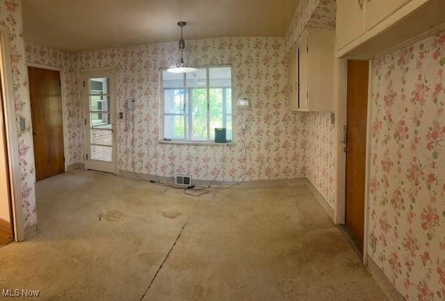 1081 Carver Rd, Cleveland Heights, OH 44112 - unfurnished dining area featuring wallpapered walls and baseboards