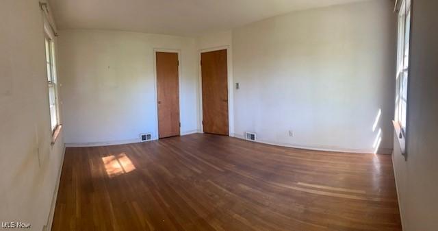 1081 Carver Rd, Cleveland Heights, OH 44112 - empty room with wood finished floors