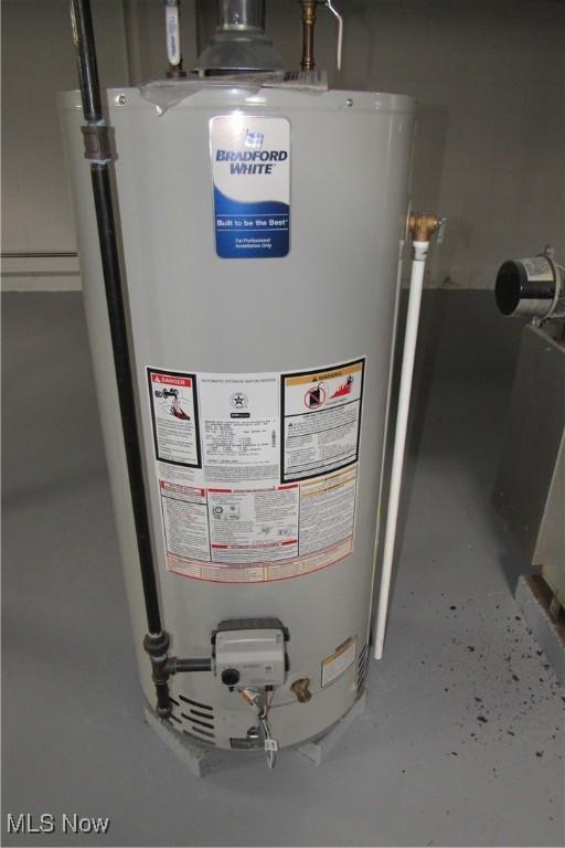 3318 Avon Blvd, Ashtabula, OH 44004 - utility room featuring gas water heater