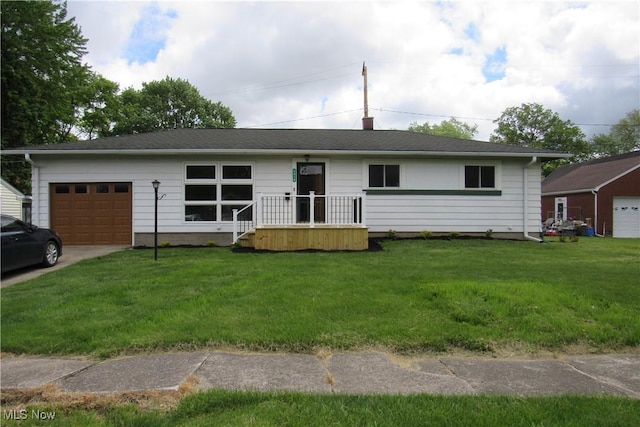 3318 Avon Blvd, Ashtabula, OH 44004 - ranch-style house with a garage, a front lawn, and driveway
