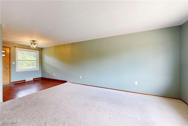 2920 Linda Way, Steubenville, OH 43952 - spare room with carpet, baseboards, and wood finished floors