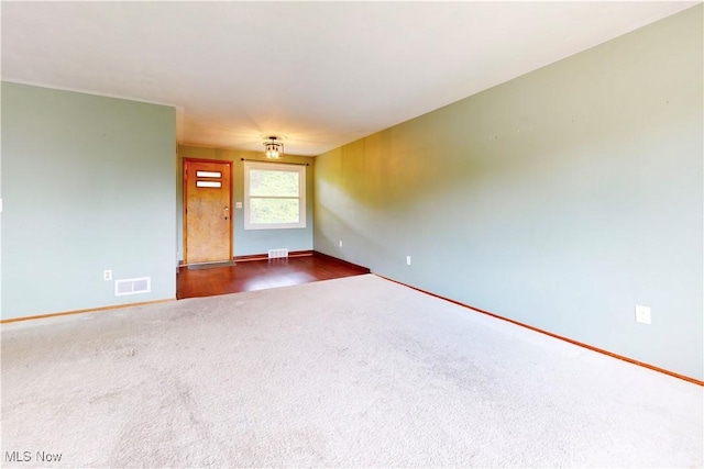 2920 Linda Way, Steubenville, OH 43952 - spare room featuring dark carpet and baseboards