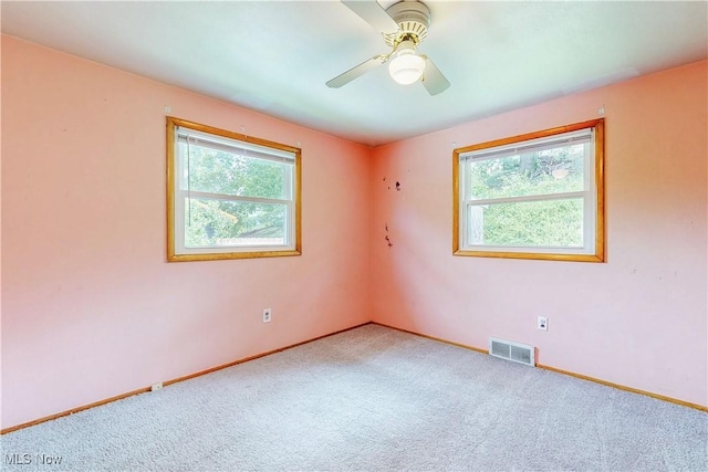 2920 Linda Way, Steubenville, OH 43952 - unfurnished room featuring plenty of natural light, carpet flooring, baseboards, and a ceiling fan