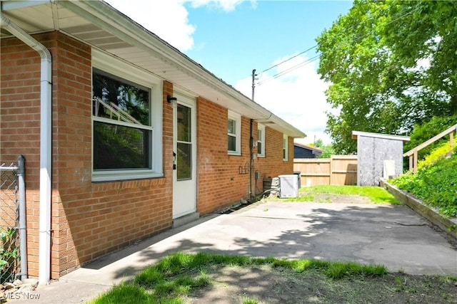 2920 Linda Way, Steubenville, OH 43952 - view of side of property featuring a patio area and brick siding