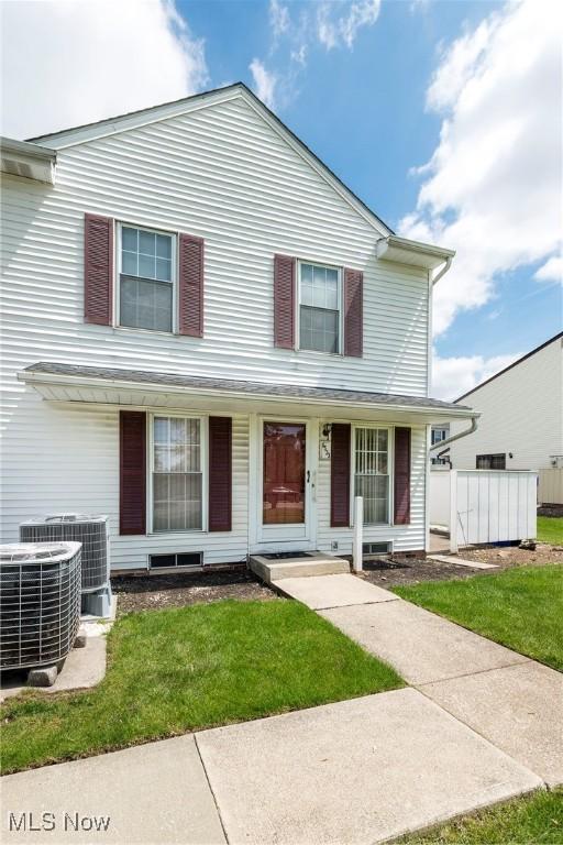 6533 Engle Rd, Brook Park, OH 44142 - traditional home featuring cooling unit and a front yard