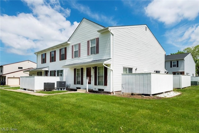 6533 Engle Rd, Brook Park, OH 44142 - rear view of property featuring central AC