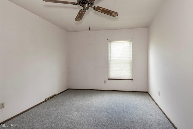 6533 Engle Rd, Brook Park, OH 44142 - carpeted empty room with a ceiling fan and baseboards