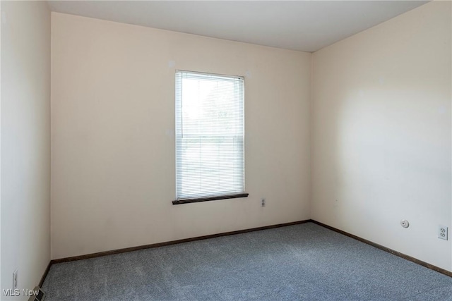 6533 Engle Rd, Brook Park, OH 44142 - spare room featuring carpet floors and baseboards