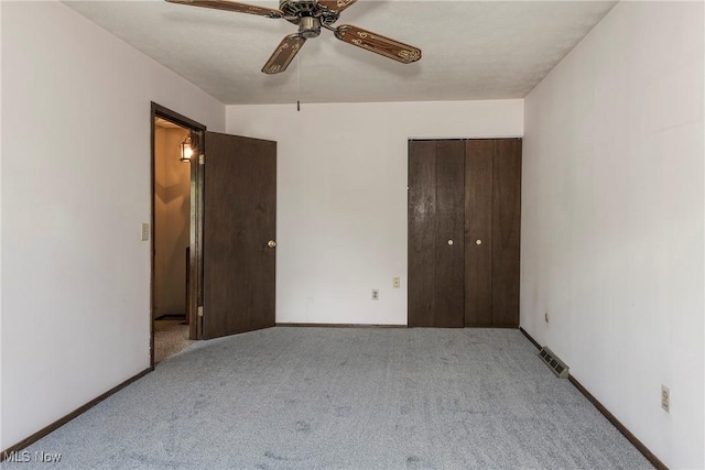 6533 Engle Rd, Brook Park, OH 44142 - unfurnished bedroom featuring carpet floors, a closet, baseboards, and ceiling fan