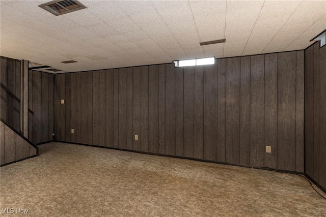 6533 Engle Rd, Brook Park, OH 44142 - below grade area with wooden walls, carpet, and stairs