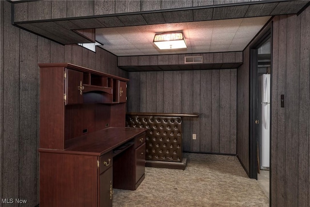 6533 Engle Rd, Brook Park, OH 44142 - home office with wood walls and light carpet