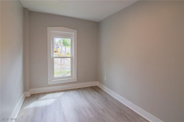 207 W Main St, Saint Clairsville, OH 43950 - unfurnished room featuring light wood-style floors and baseboards