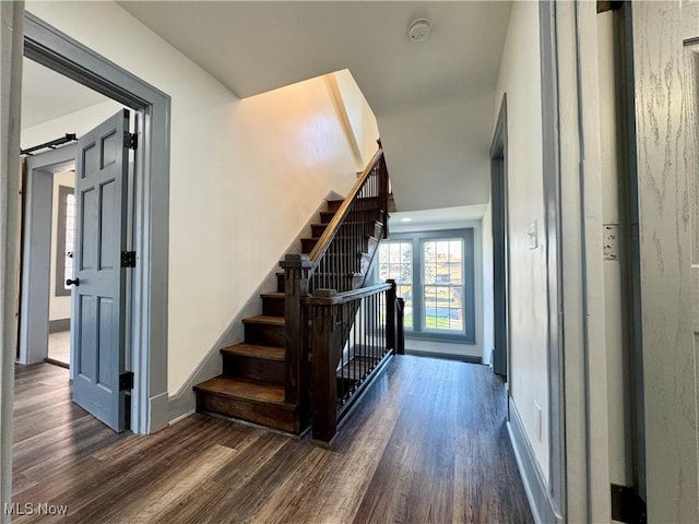 1247 11th St NW, Canton, OH 44703 - stairway featuring wood finished floors and baseboards