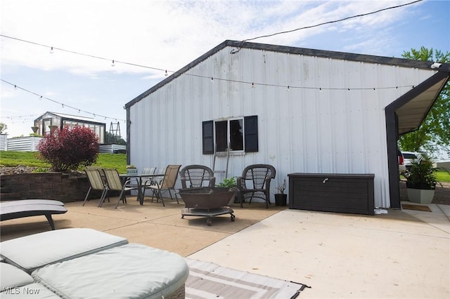 9012 Winesburg Rd, Dundee, OH 44624 - back of property featuring a patio area