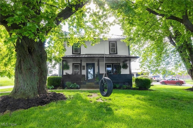 9012 Winesburg Rd, Dundee, OH 44624 - view of front of home featuring a porch and a front lawn