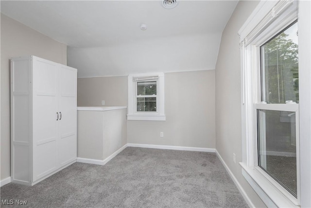 635 Fair Oaks Ave NW, North Canton, OH 44720 - bonus room with vaulted ceiling, carpet flooring, healthy amount of natural light, and baseboards