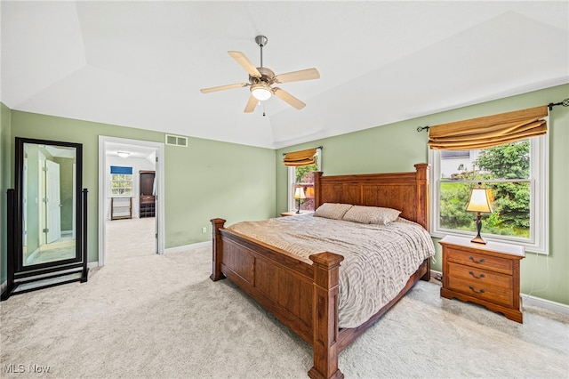 7776 Keystone Dr, Concord, OH 44077 - bedroom featuring light colored carpet, lofted ceiling, baseboards, and a ceiling fan