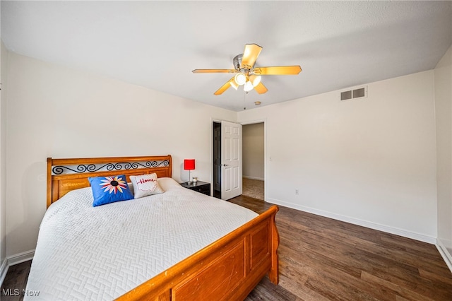 7776 Keystone Dr, Concord, OH 44077 - bedroom featuring dark wood-type flooring, baseboards, and ceiling fan