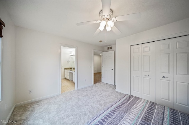 7776 Keystone Dr, Concord, OH 44077 - unfurnished bedroom featuring light colored carpet, baseboards, a closet, and ceiling fan