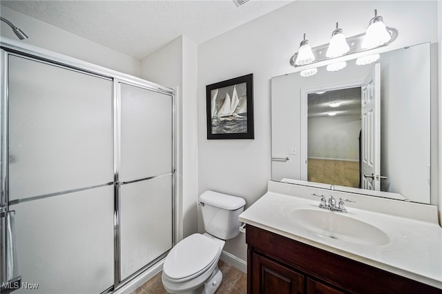 7776 Keystone Dr, Concord, OH 44077 - bathroom with toilet, vanity, a shower stall, baseboards, and a textured ceiling