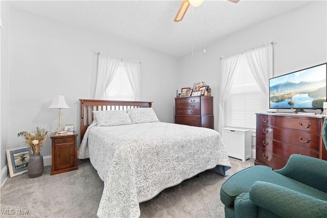 226 N 19th St, Sebring, OH 44672 - bedroom featuring light carpet, ceiling fan, and baseboards