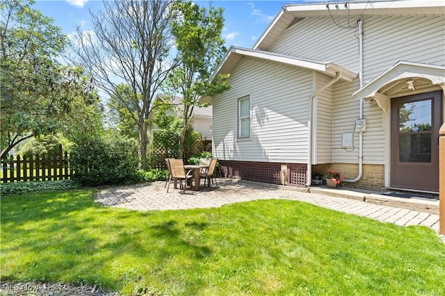 226 N 19th St, Sebring, OH 44672 - rear view of house with a patio
