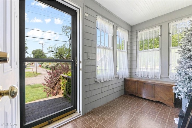 226 N 19th St, Sebring, OH 44672 - unfurnished sunroom with brick patterned flooring