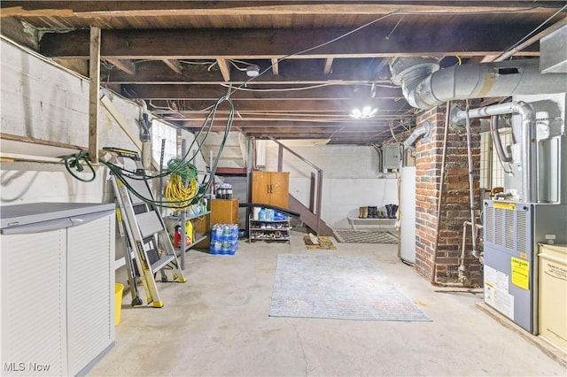 226 N 19th St, Sebring, OH 44672 - unfinished basement with water heater, electric panel, and heating unit