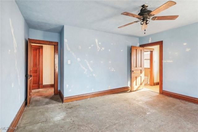 604 E Lincoln Way, Lisbon, OH 44432 - unfurnished bedroom with baseboards and concrete floors