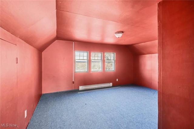 604 E Lincoln Way, Lisbon, OH 44432 - additional living space featuring a baseboard heating unit, vaulted ceiling, and carpet flooring