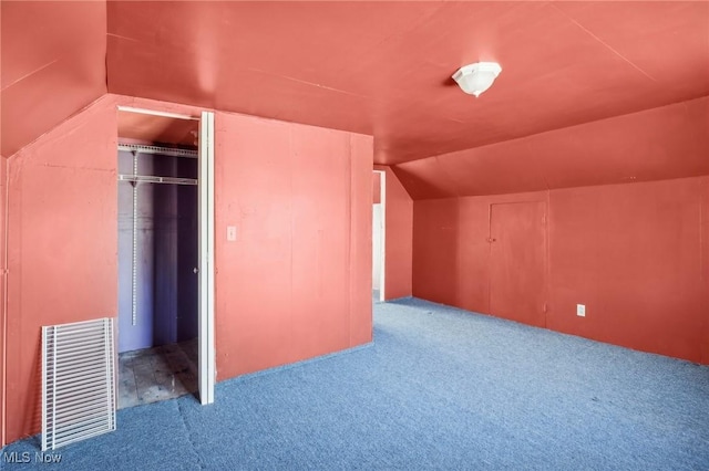 604 E Lincoln Way, Lisbon, OH 44432 - additional living space with carpet and lofted ceiling