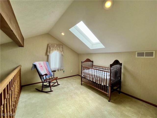 33939 Hanover Woods Trl, Solon, OH 44139 - bedroom featuring a skylight, vaulted ceiling, carpet flooring, baseboards, and a textured ceiling