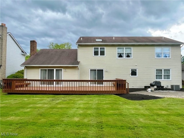 33939 Hanover Woods Trl, Solon, OH 44139 - rear view of property with a lawn, a deck, a chimney, and central AC unit