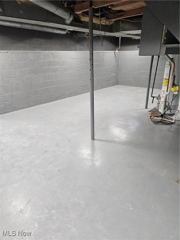 5102 Andrus Ave, North Olmsted, OH 44070 - unfinished basement with gas water heater and heating unit