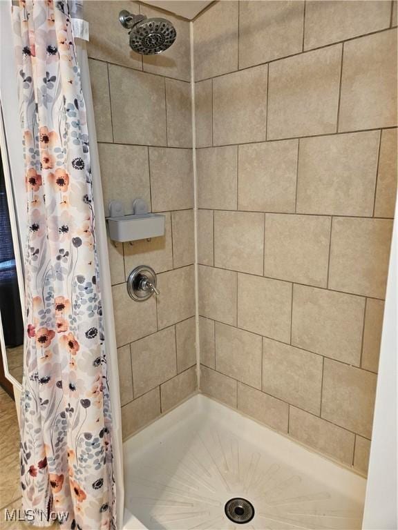5102 Andrus Ave, North Olmsted, OH 44070 - bathroom featuring a tile shower