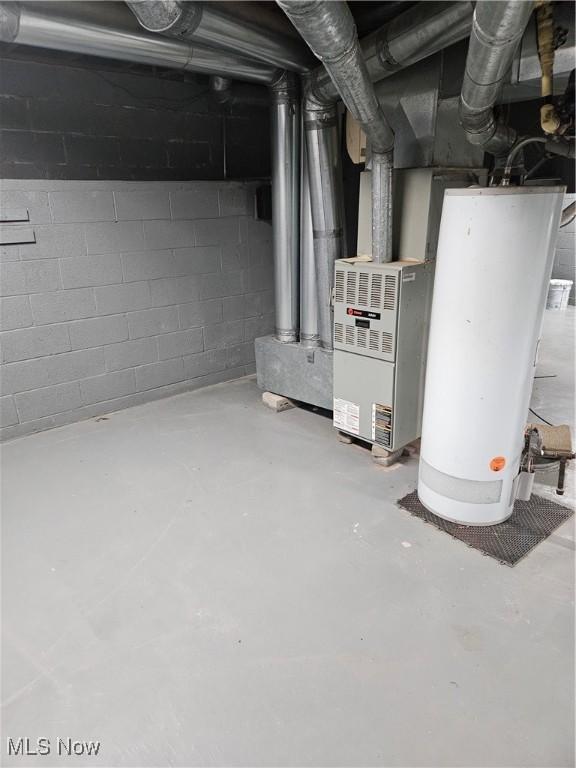5102 Andrus Ave, North Olmsted, OH 44070 - unfinished below grade area with gas water heater