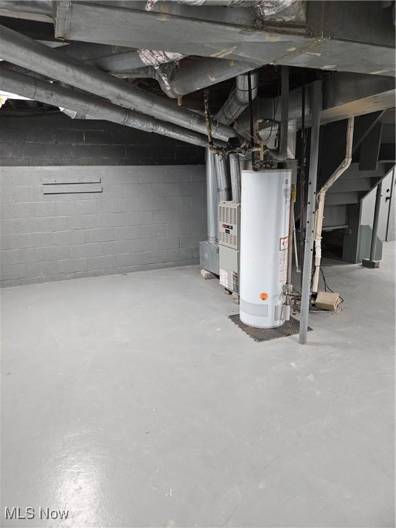 5102 Andrus Ave, North Olmsted, OH 44070 - unfinished basement with gas water heater