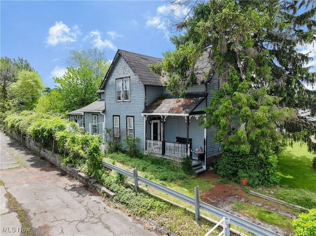 28900 Euclid Ave, Wickliffe, OH 44092 - view of front of home with covered porch and roof with shingles