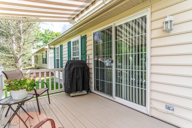 8121 Hitchcock Rd Unit 1, Youngstown, OH 44512 - wooden terrace featuring a grill
