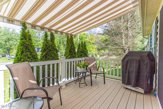 8121 Hitchcock Rd Unit 1, Youngstown, OH 44512 - wooden deck featuring area for grilling and view of wooded area