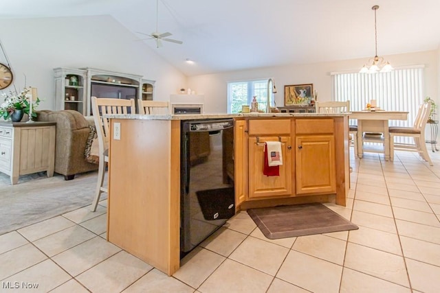 8121 Hitchcock Rd Unit 1, Youngstown, OH 44512 - kitchen featuring dishwasher, light tile patterned floors, vaulted ceiling, a ceiling fan, and light countertops