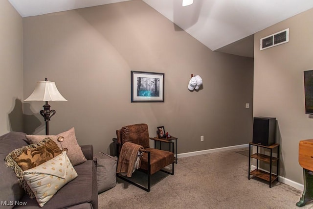 8121 Hitchcock Rd Unit 1, Youngstown, OH 44512 - sitting room featuring light carpet, baseboards, and vaulted ceiling
