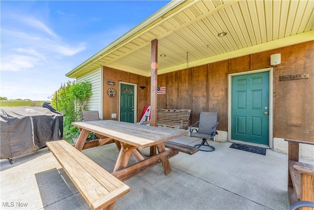 9903 Vermilion Rd, Amherst, OH 44001 - view of patio / terrace featuring outdoor dining area
