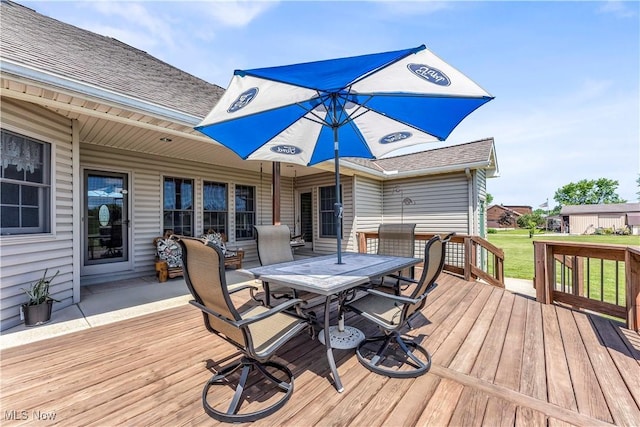 9903 Vermilion Rd, Amherst, OH 44001 - wooden deck with outdoor dining area